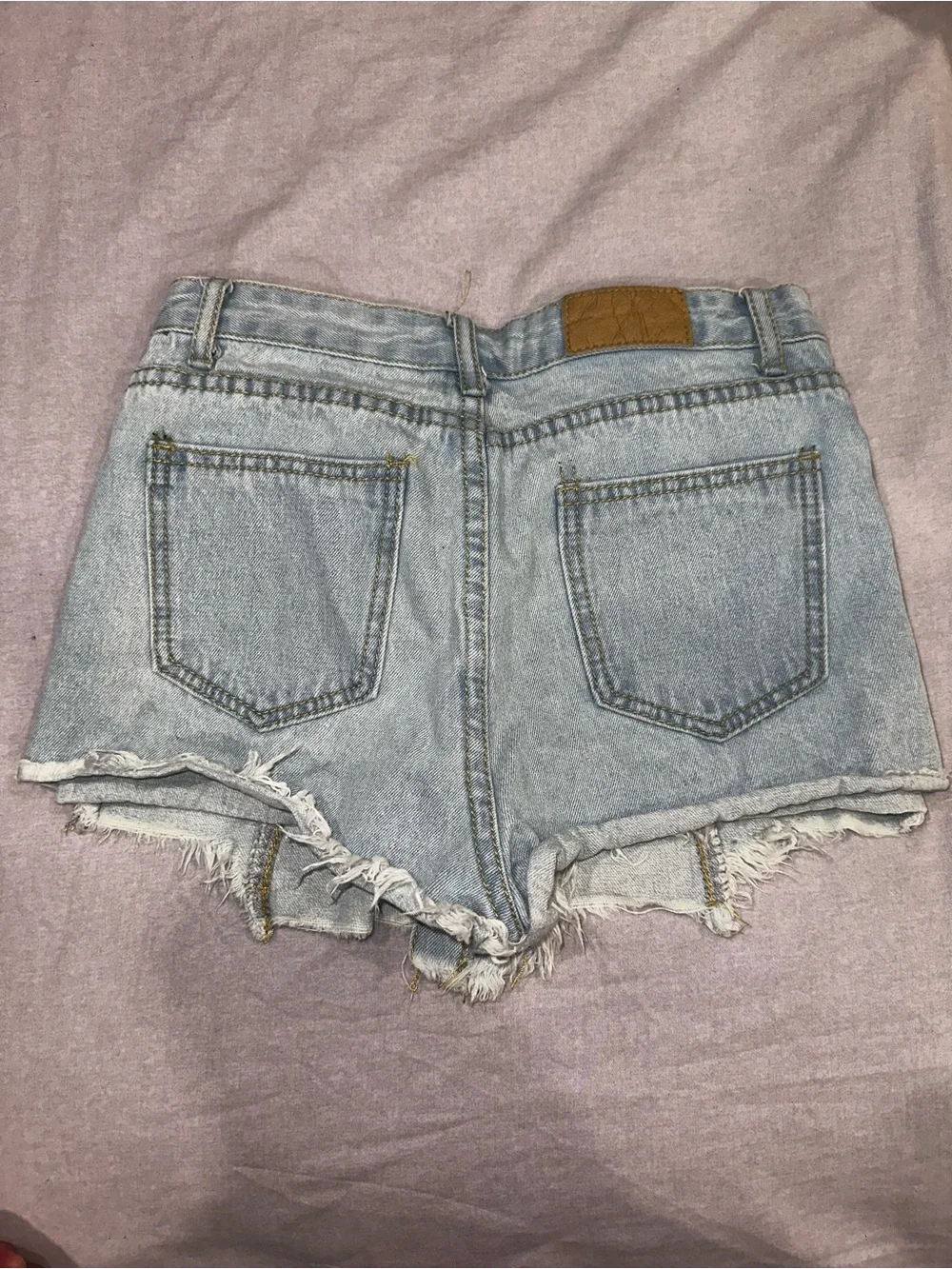 Button-Front Light Blue Denim Short Shorts with Frayed Hem